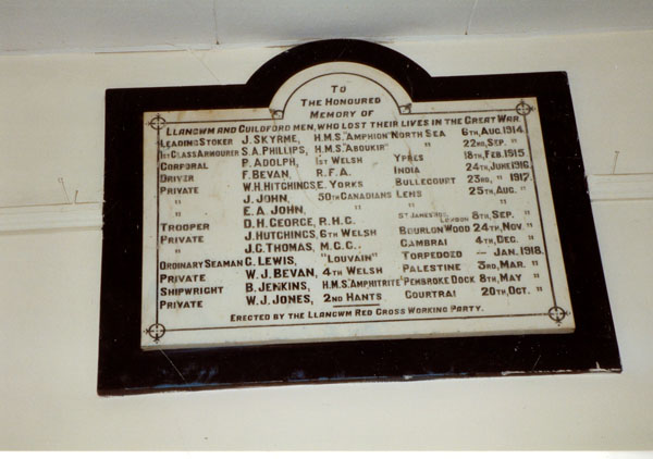 Photograph of the Llangwm World War One Memorial to those who lost their lives. Names mentioned include J Skyrme, S A Phillips, P Adolph, W H Hitchings, J John, E A John, D H George, J Hutchings, J C Thomas, C Lewis, W J Bevan, B Jenkins, W J Jones